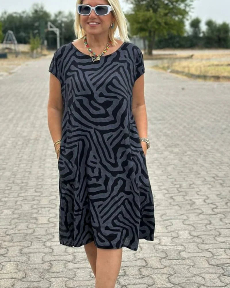 Iris - Zomer jurk met ronde hals en mooie print