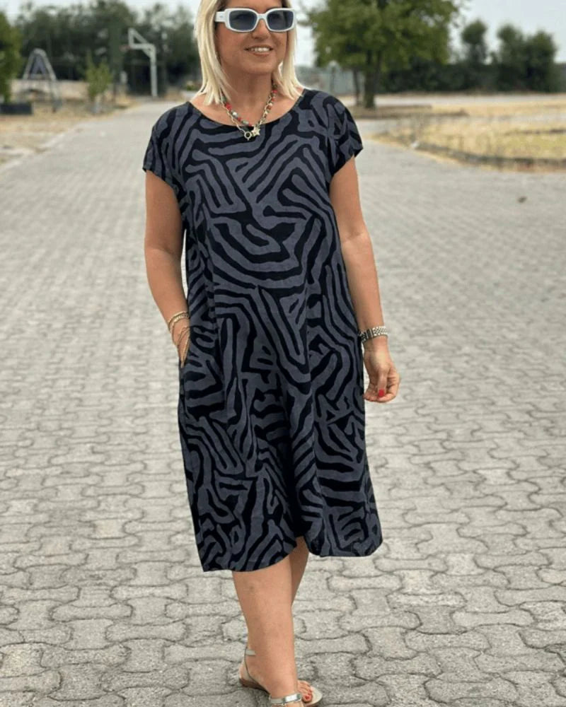Iris - Zomer jurk met ronde hals en mooie print
