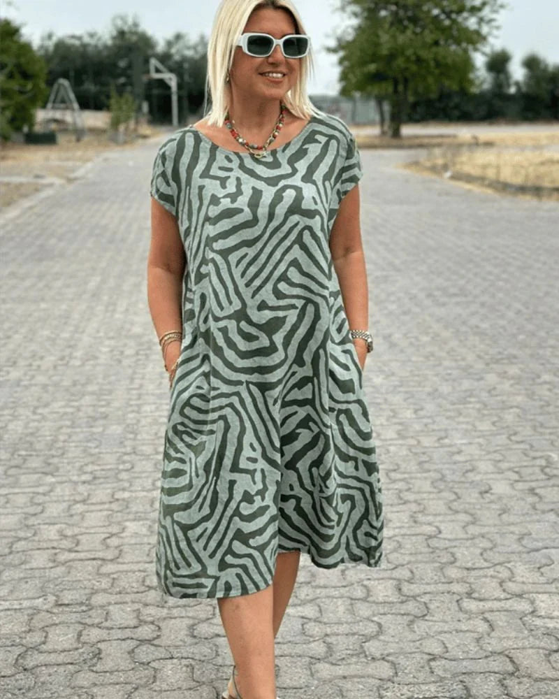 Iris - Zomer jurk met ronde hals en mooie print