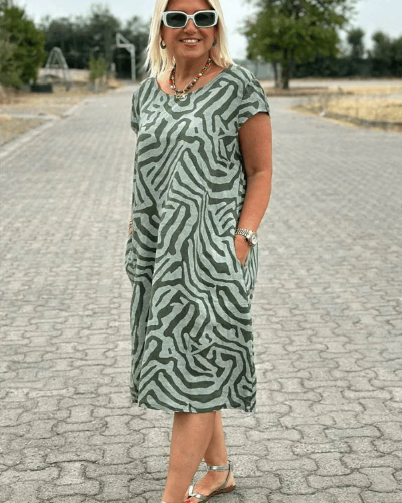 Iris - Zomer jurk met ronde hals en mooie print