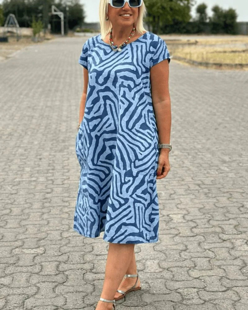 Iris - Zomer jurk met ronde hals en mooie print