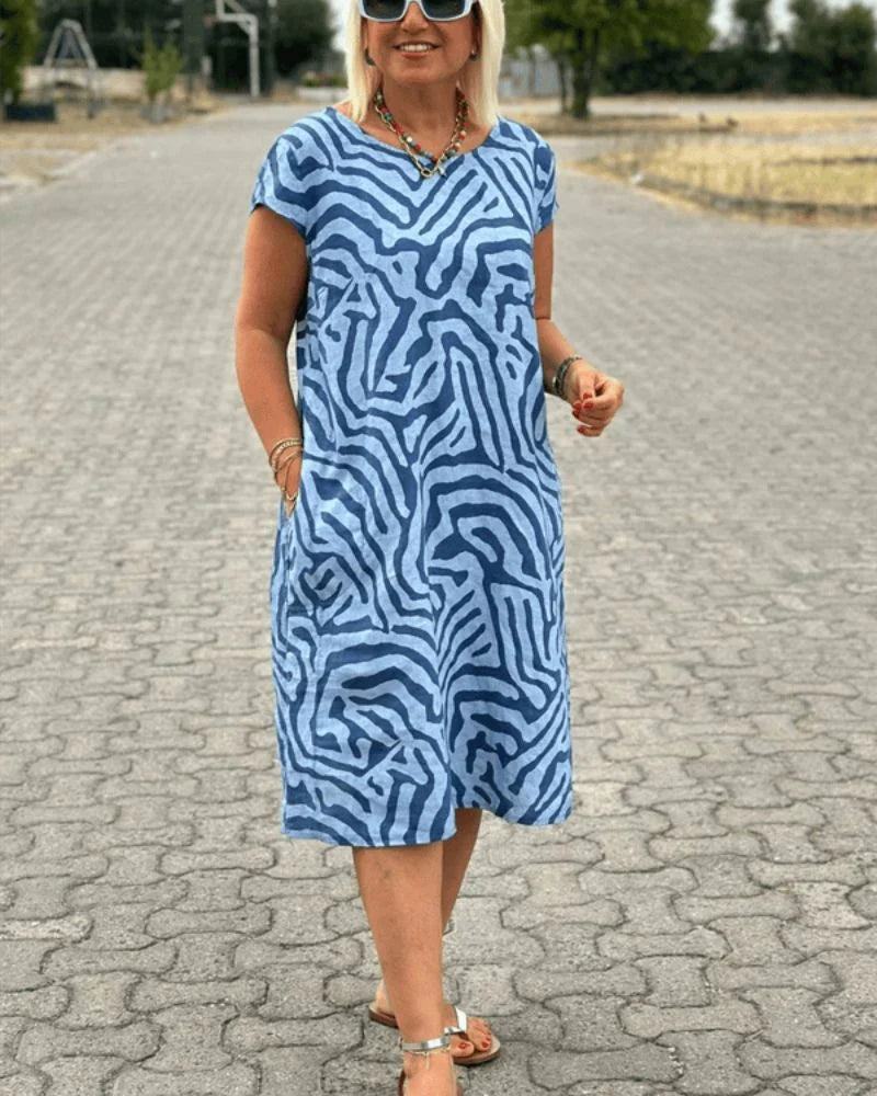 Iris - Zomer jurk met ronde hals en mooie print